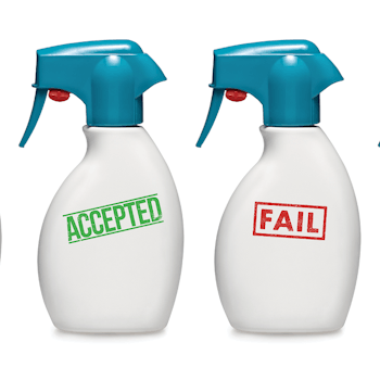 two spray bottles, one labeled accepted, one labeled fail
